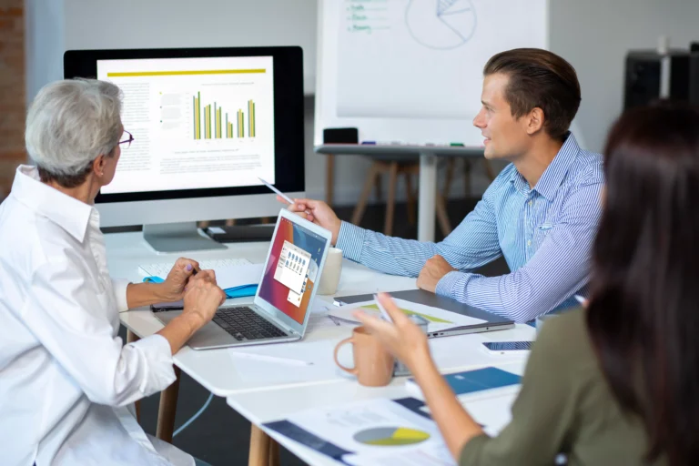 people-using-digital-device-while-meeting